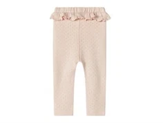 Lil Atelier leggings peach whip med hulmønster